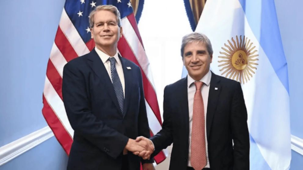 Scott Bessen y Luis Caputo.