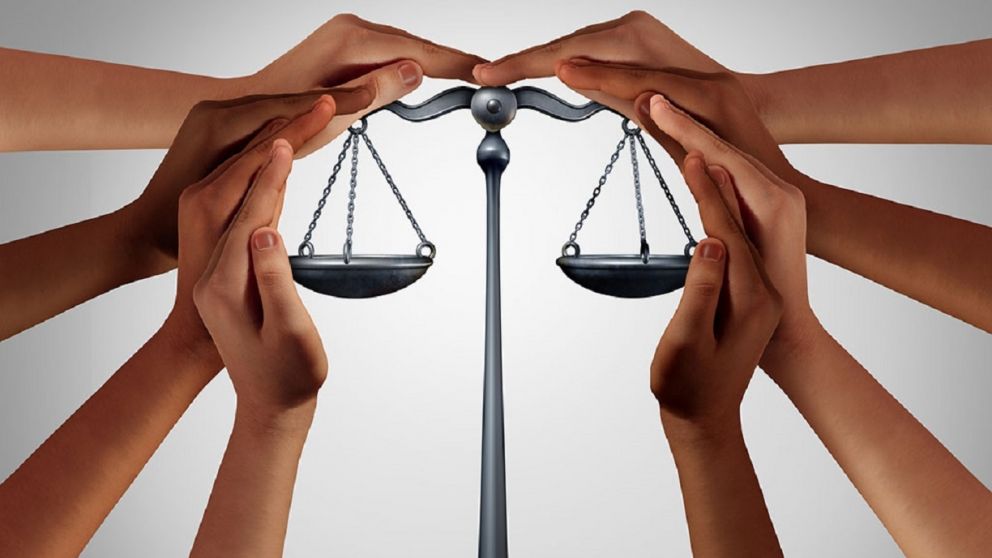 Social security and law welfare government benefits with a group of diverse people holding a justice scale with 3D illustration elements.-Not Released (NR)