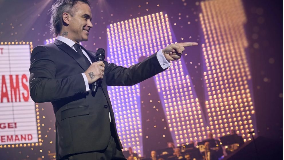 Robbie Williams, afuera