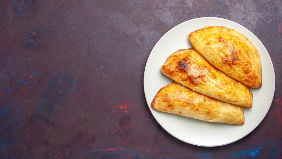 top view baked pastries bread like inside plate on the dark background pastry sweet bake tea cake sugar