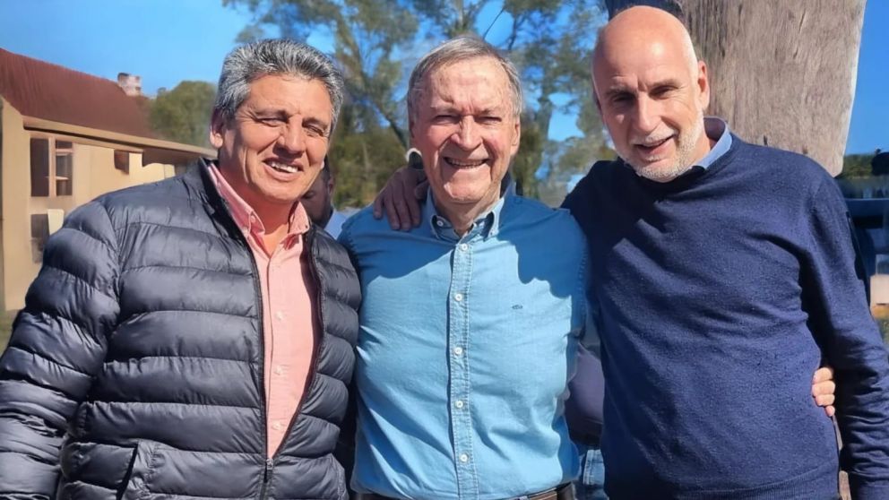 Juan Schiaretti y Julio Bañuelos