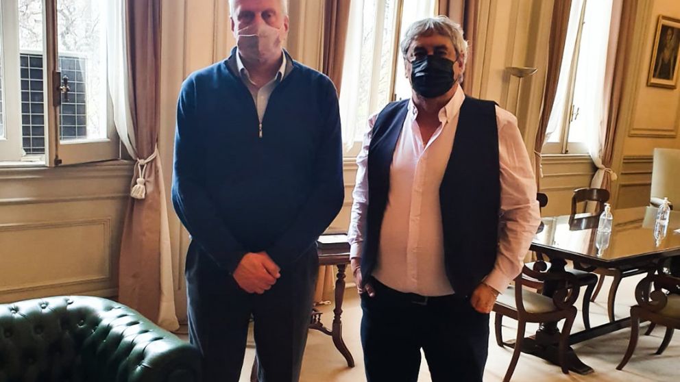 El cegetista Sergio Romero (UDA) junto al ministro Jaime Perczyk