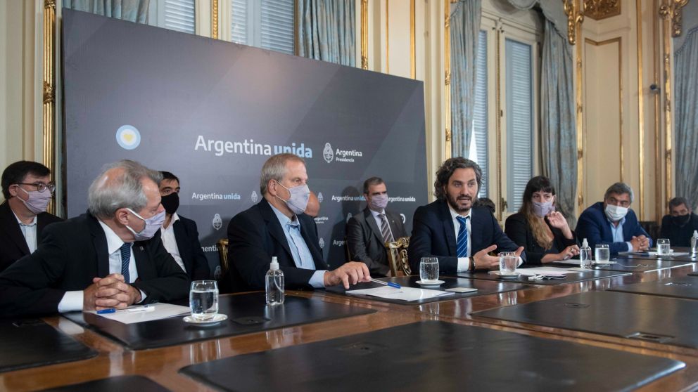 Cafiero junto a directivos de universidades