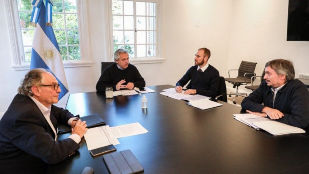 Los diputados Máximo Kirchner y Carlos Heller afinaron la letra del proyecto con el presidente Alberto Fernández y el ministro Martín Guzmán