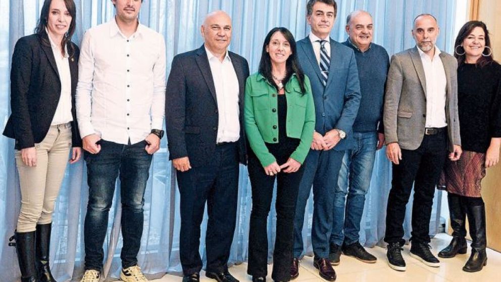 El CEO del Grupo Crónica, Raúl Olmos, y el vicepresidente Marcelo Carbone con los invitados