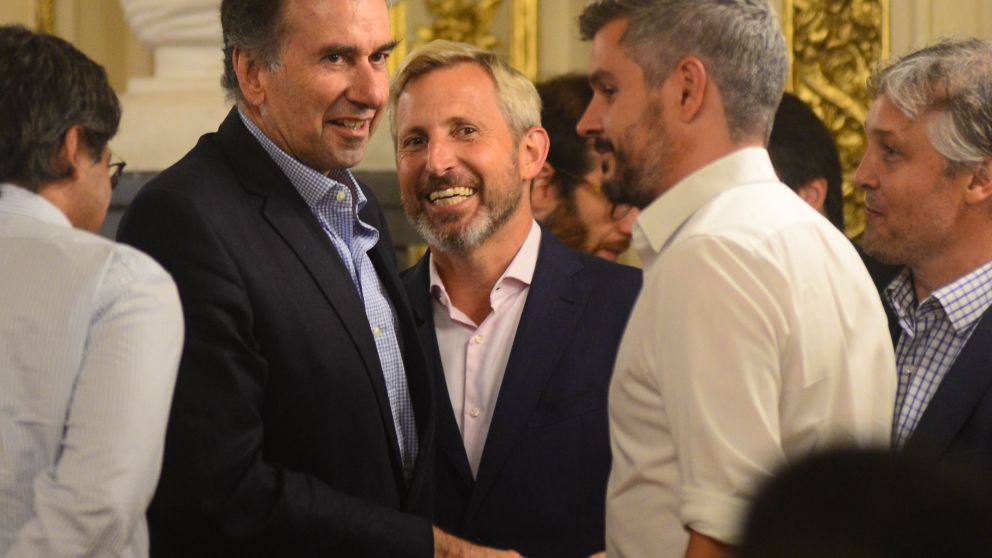 Schiavone y Pe�a, primera l�nea. Frigerio sonr�e, pero pesa menos